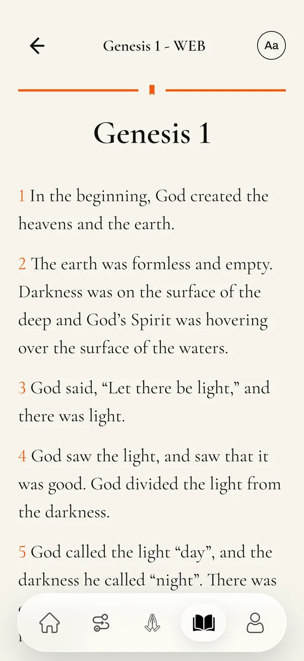 The Bible reader open at Genesis 1